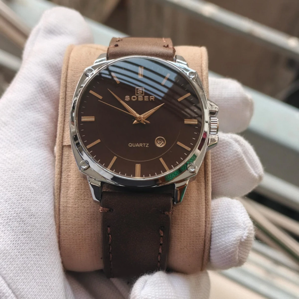 Sober Watch Model 985 Premium Watch Belt Coffe Round Silver Dial Coffe Colour Watch For Man + এক পিস ব্যাটারি ফ্রি।