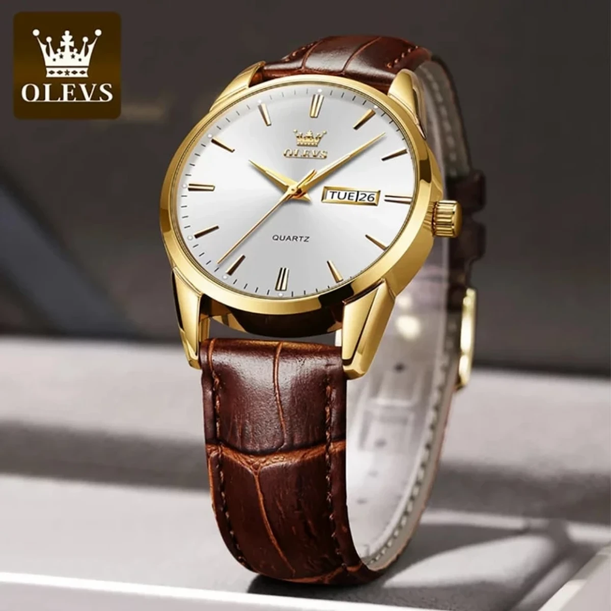 OLEVS WATCH MODEL 6898 FASHION WATCH FOR MEN BELT BROWN DIAL WHITE  COLOUR WATCH FOR MEN + এক পিস ব্যাটারি ফ্রি।